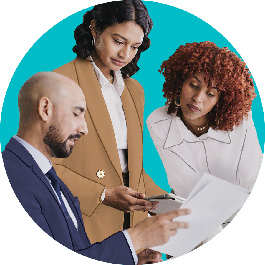 A group of professionals look over data together.