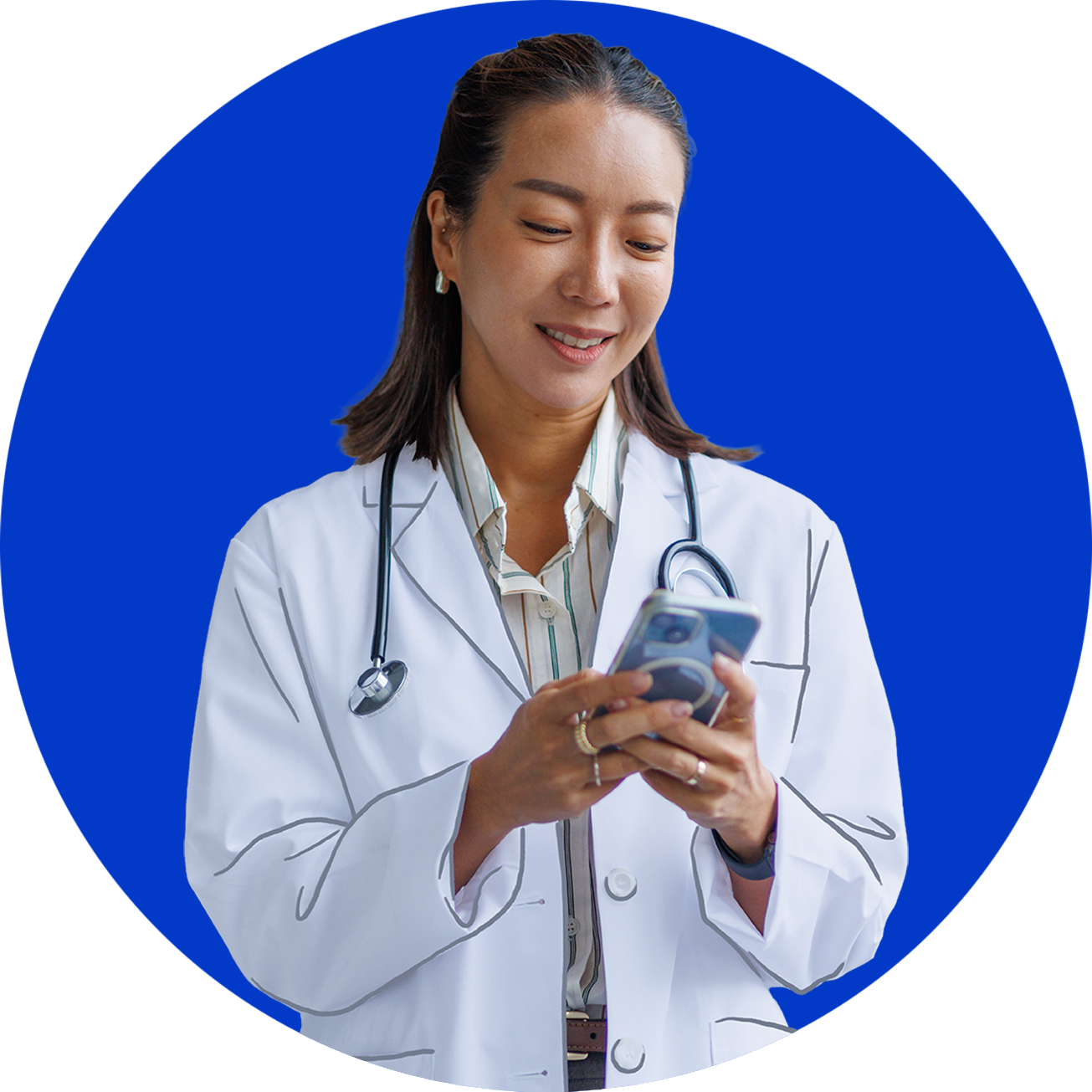 A doctor looks at her phone.
