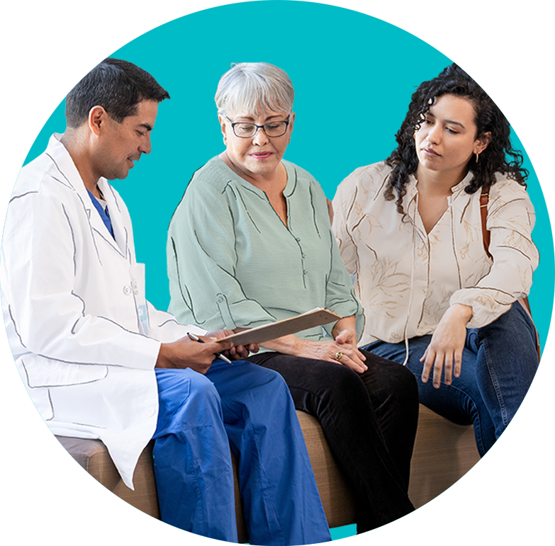 A doctor shares results with a patient and her daughter.
